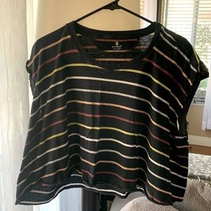 Free People Movement. Workout top. Blue with stripes. Size medium.